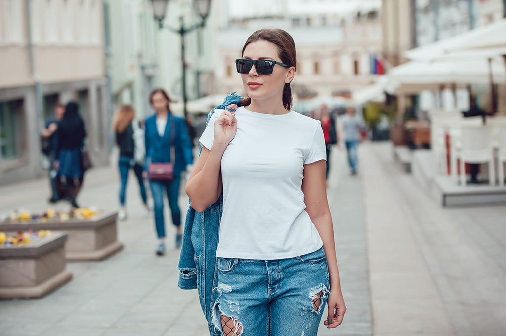 Modern women walk into street